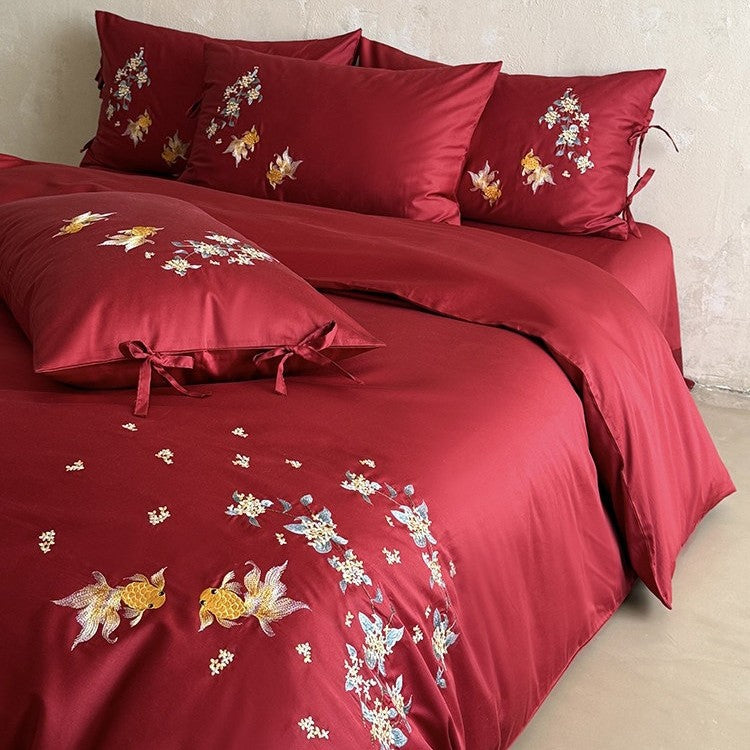 Luxuriöses Satin-Bettwäscheset mit aufwendiger floral-fischiger Stickerei