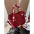 Stylische mit Schal verzierte Handtasche Brehn