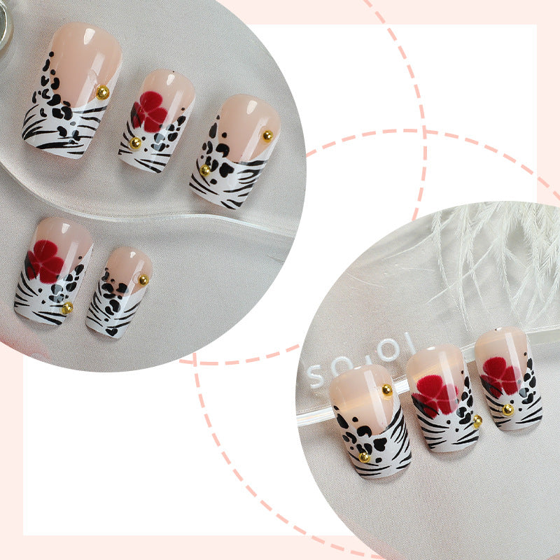 Kreatives Kunst Press-On Nagelset mit Blumen- und Zebra-Designs Brehn