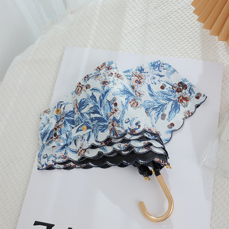 Damen eleganter Automatischer Faltregenschirm mit floralen Details Brehn