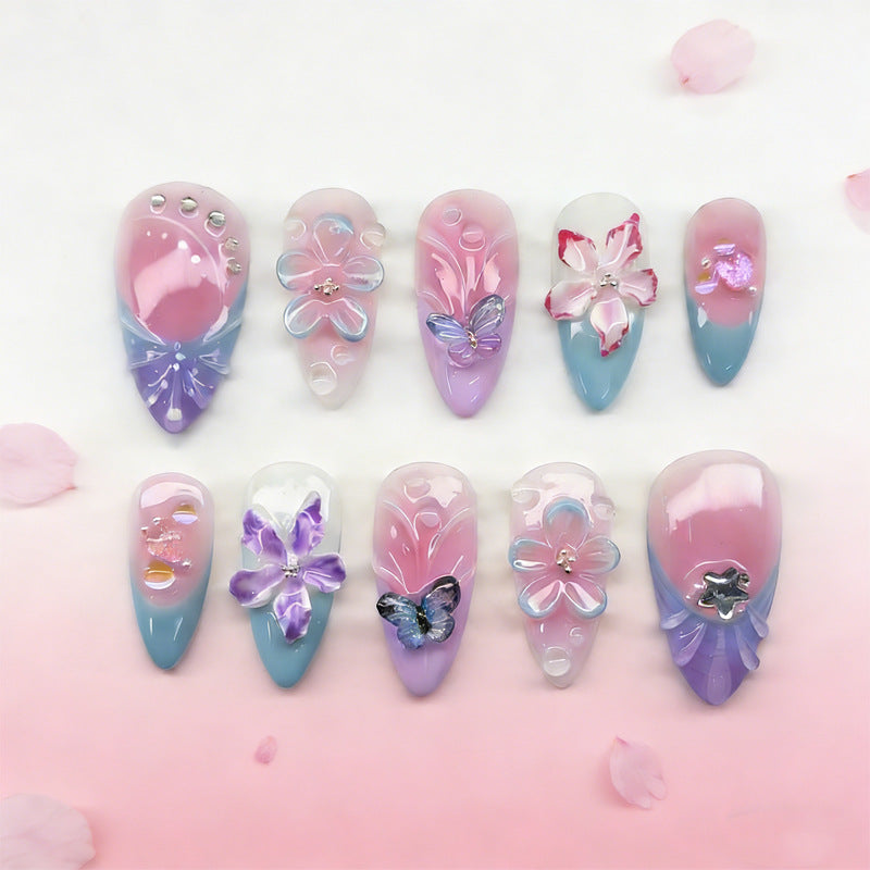 Kreatives Kunstnagelset mit floralen und Schmetterlingsmotiven Brehn