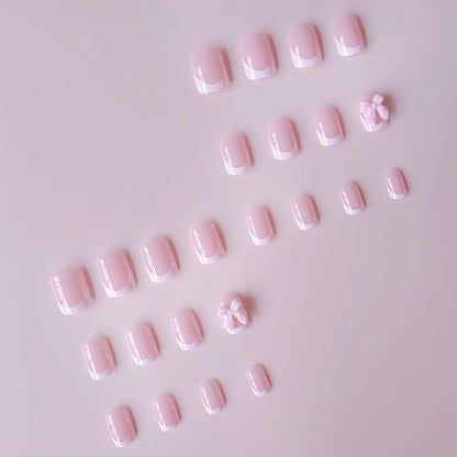 Kunstnagelset mit eleganten Spitzen und 3D Schleifenverzierungen Brehn