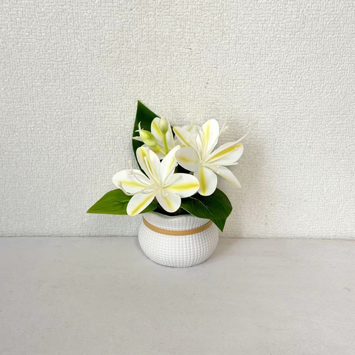Künstliches Blumenarrangement für dekorative Wohnungsdisplay