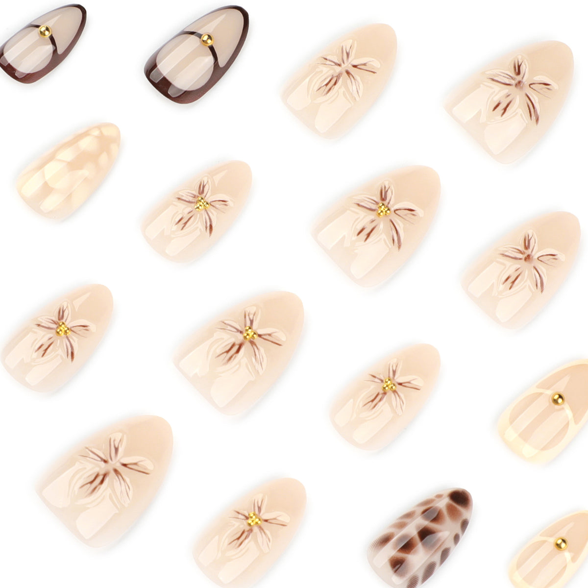 Kunstvolle Nagelverlängerungen mit floralen und Glitzerdetails Brehn