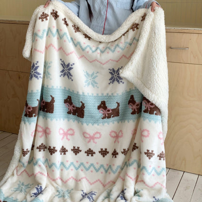 Wendbare Kuscheldecke mit Sherpa-Fleece, niedlichen Hunde-Illustrationen und kariertem Muster