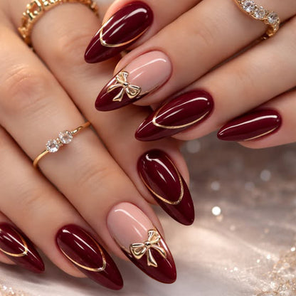 Elegante Stiletto-Nagelkunstverlängerungen mit goldenen Akzenten Brehn