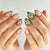Künstlerisches mandelförmiges Press-On-Nageldesign Brehn