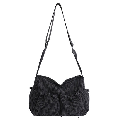 Lässige karierte Schultertasche
