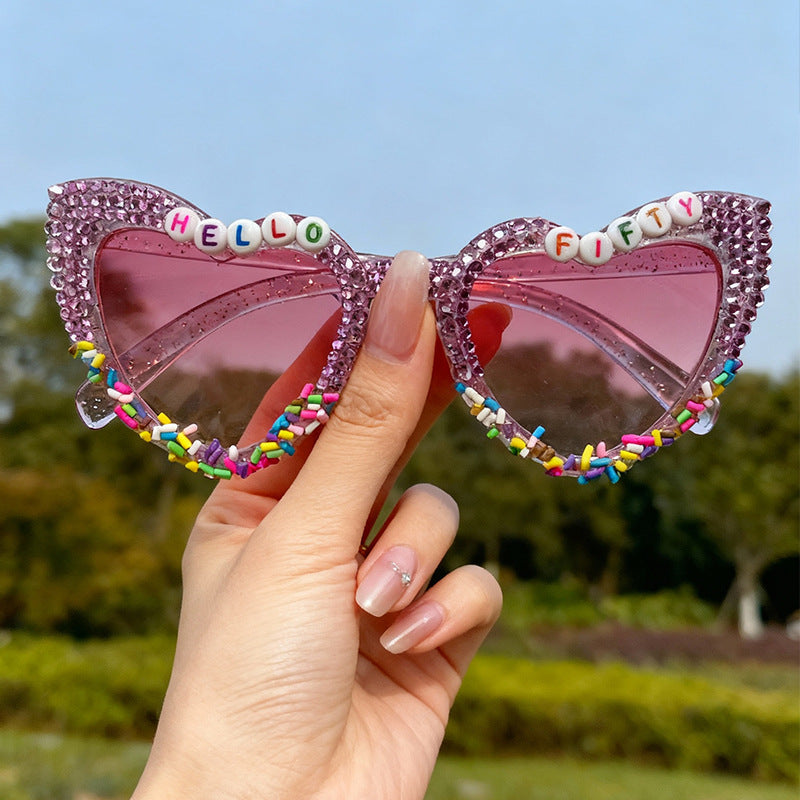 Dekorative Katzenaugen-Sonnenbrille mit Rhinestones Brehn