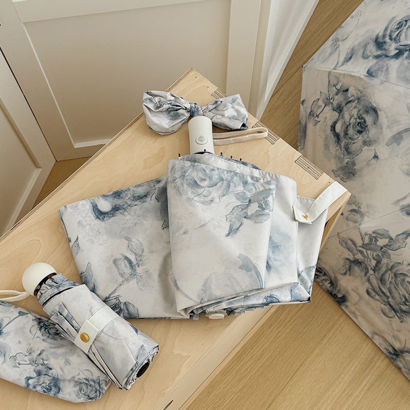 Damen Faltbarer Regenschirm mit romantischem Blumendesign Brehn