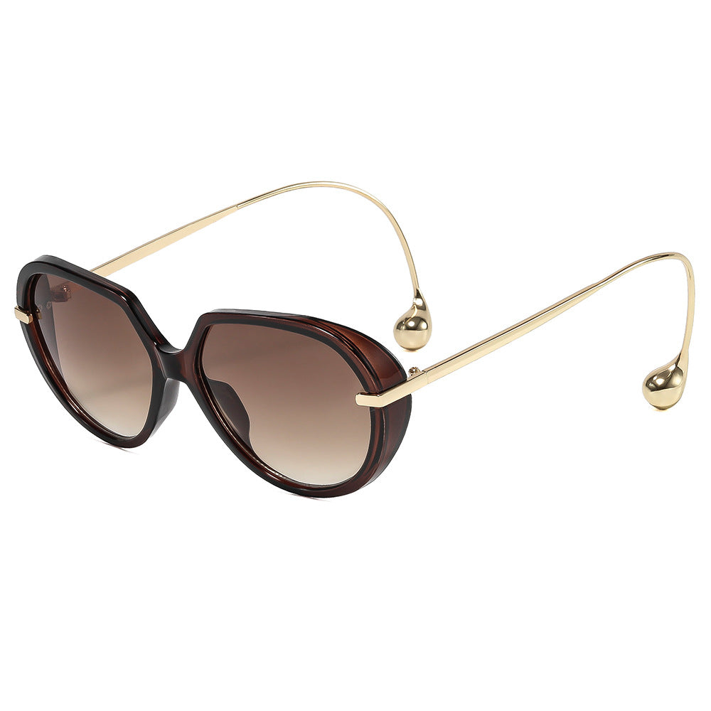 Damen Cat-Eye Sonnenbrille mit goldenen Akzenten und stylishem Rahmen Brehn