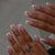 Kunstnagelset mit zartem Blumendekor Brehn