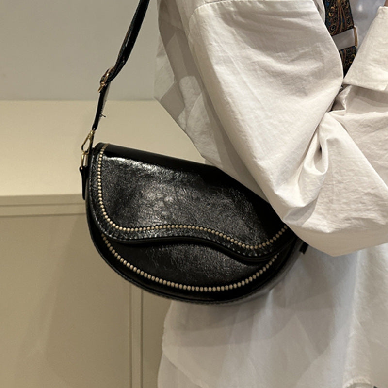 Elegante strukturierte Umhängetasche