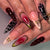 Künstlerisches Stiletto Press-On Nagelset mit einzigartigen Akzenten Brehn