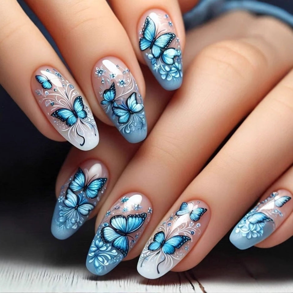 Kunstnagelset mit filigranen Schmetterlings- und Blütenmotiven Brehn