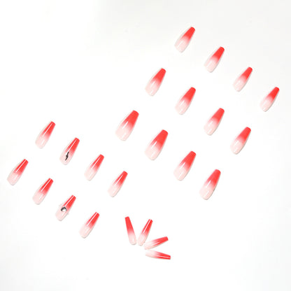 Kunstvolle Stiletto-Nägel mit elegantem Farbverlauf und Strassverzierung Brehn