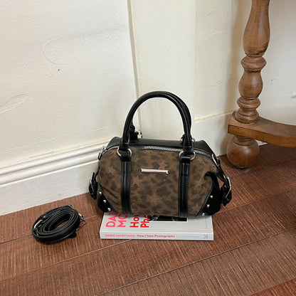 Zeitgenössische gemusterte Handtasche