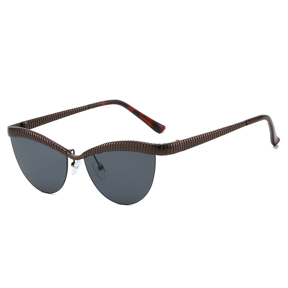 Statement Cat-Eye Sonnenbrille mit sculptierten Metallrahmen Brehn