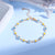 Eye Charm und Daisy Armband Brehn