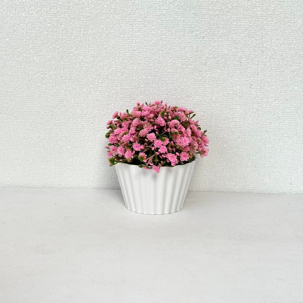 Dekorative Mini-Blumenarrangement