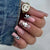 Künstlerische Nageldekoration Brehn