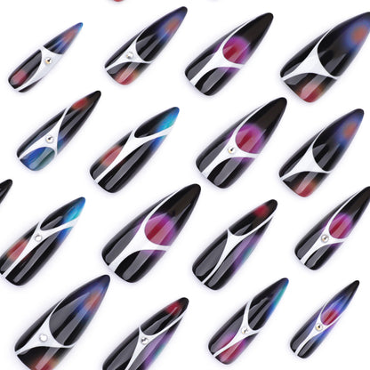 Kunstvolle Stiletto-Nägel mit glitzernden Akzenten und geometrischem Design Brehn