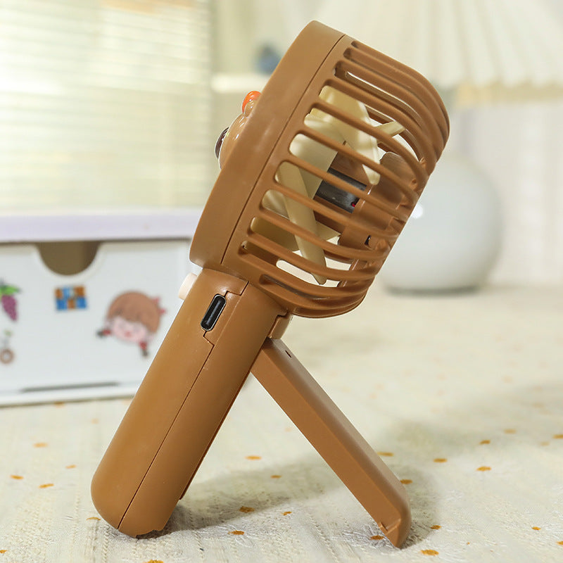 Unisex nan tragbarer wiederaufladbarer USB-Handventilator mit niedlichem Bärenmotiv und Standfuß Brehn