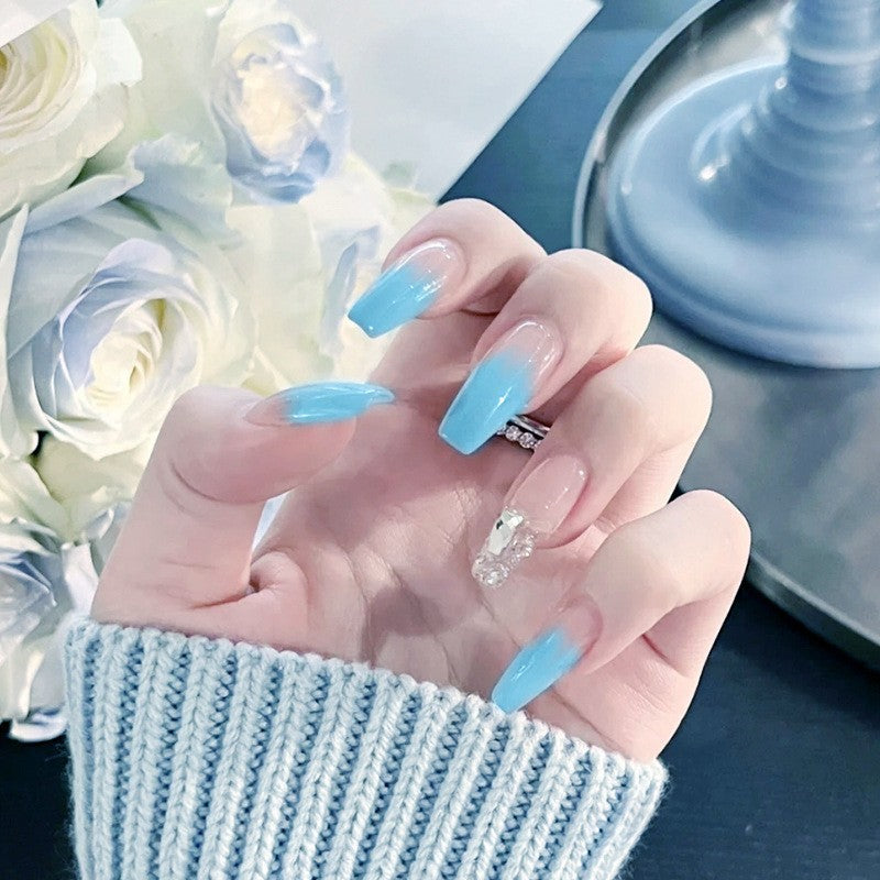 Kunstnagelset mit eleganten Ombre- und Glitzerakzenten Brehn