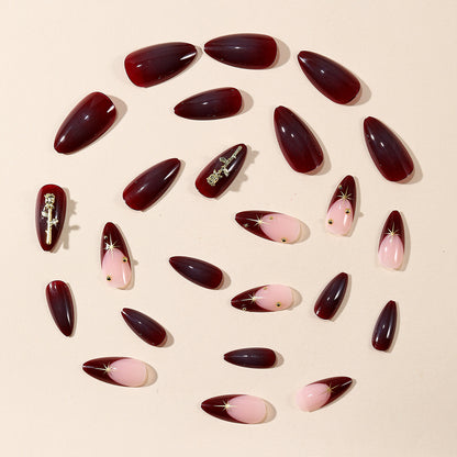 Stiletto Nagelkunst Extensions mit goldenen Akzenten Brehn