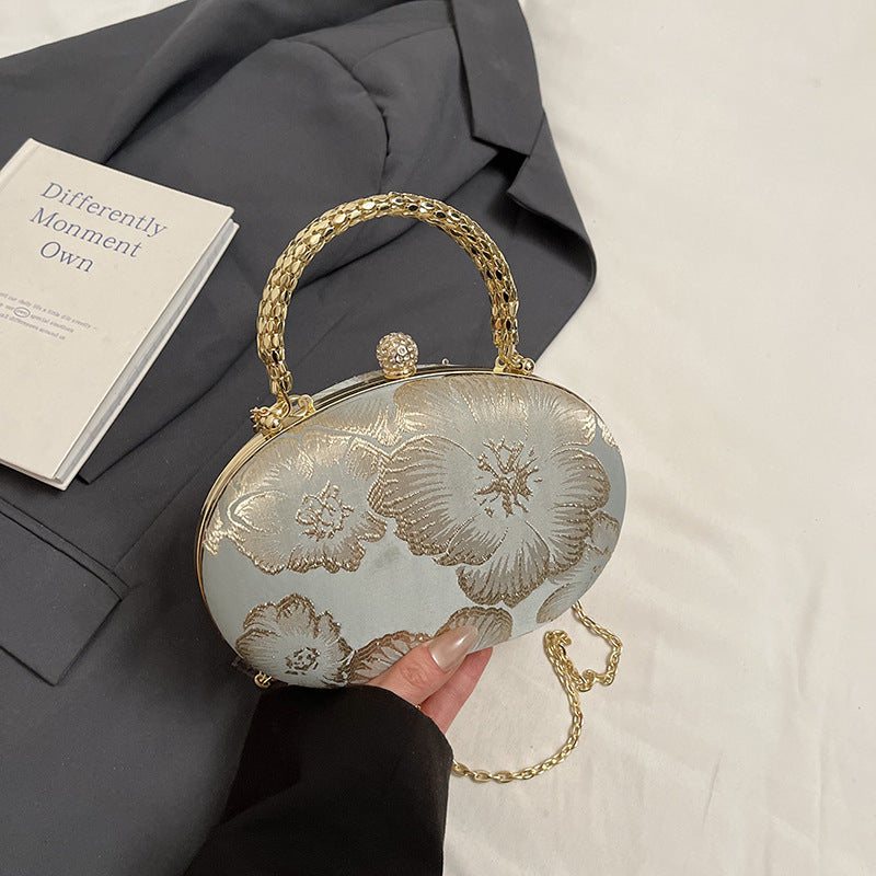 Elegante Blumen Abendtasche Brehn
