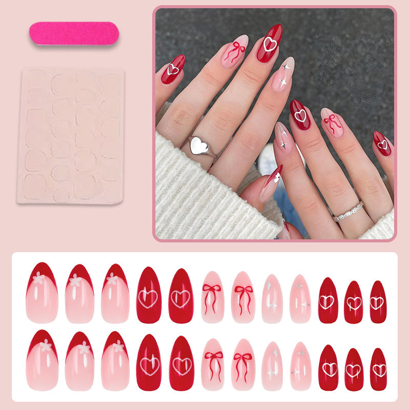 Kunstnagelset mit romantischen Herzen und Schleifen Brehn