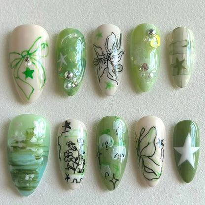 Künstlerische grüne Nagelverbesserungen Brehn