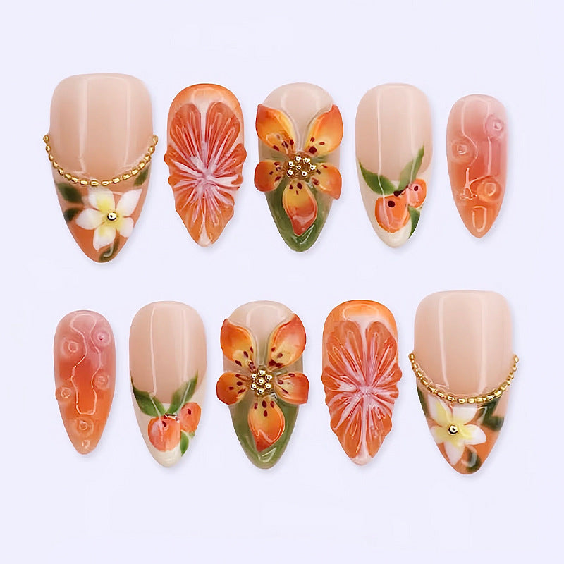 Kunstnagelset mit romantischen Blüten und fruchtigen Akzenten Brehn