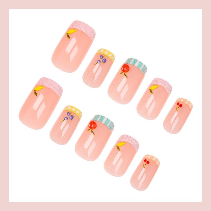 Kunstnagelset mit fröhlichen Obst-Designs und bunten Akzenten Brehn