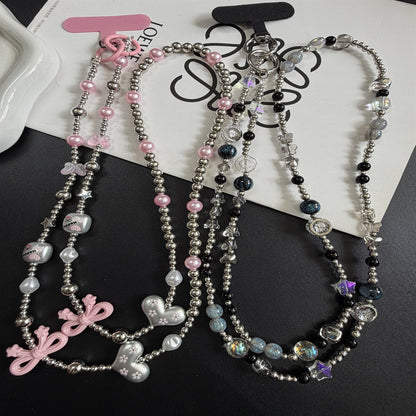 Mehrsträngige Perlenkette mit Charms Brehn
