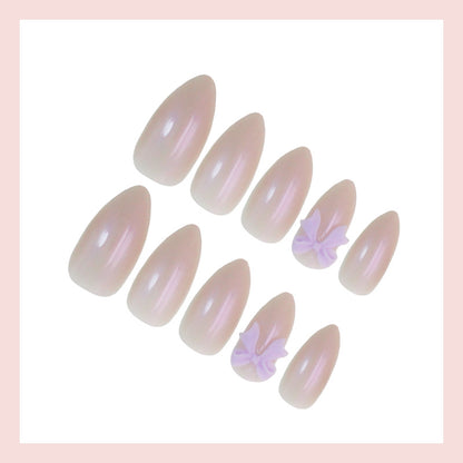 Kunstnagelset mit eleganten Schleifchen und sanftem Design Brehn