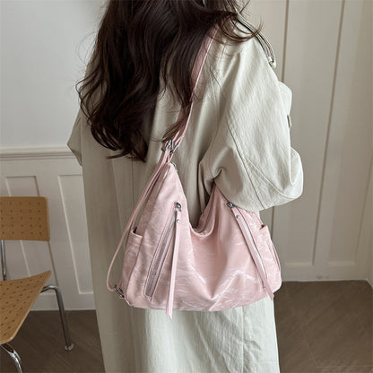 Vielseitige strukturierte Hobo-Tasche