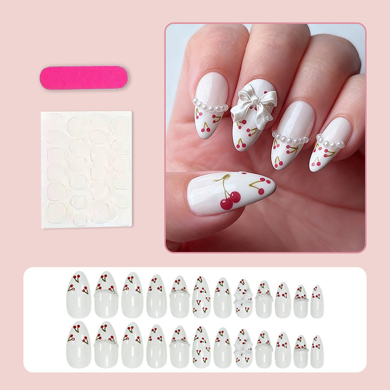 Kunstnagelset mit floralen Cherrymotiven und eleganten Schleifen Brehn