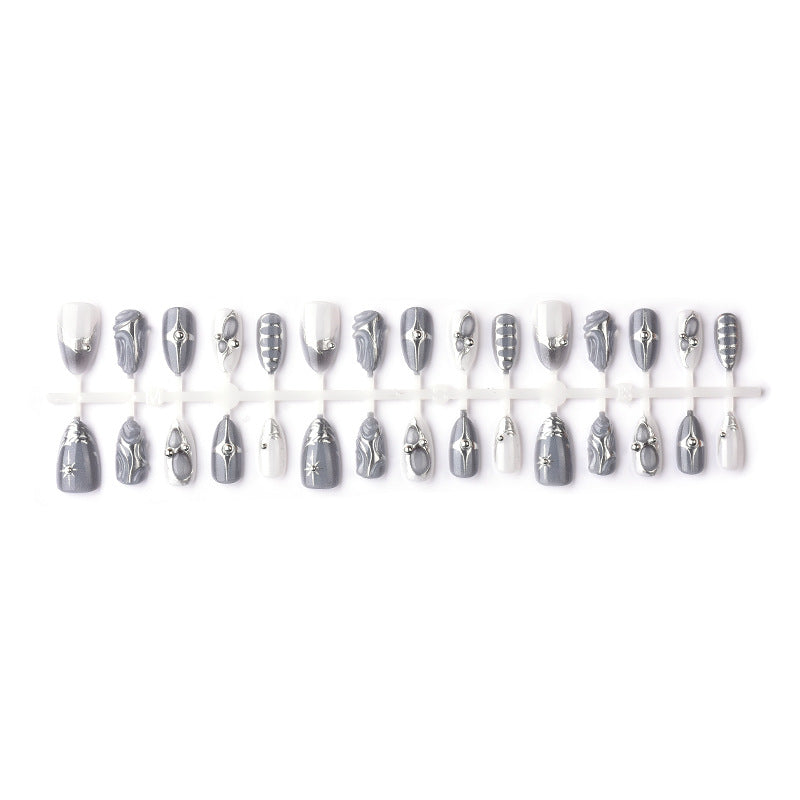 Künstlerisches Drucknagelset mit metallischen Akzenten Brehn