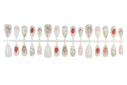 Kunstnagelset mit floralen Motiven und verspielten Details Brehn