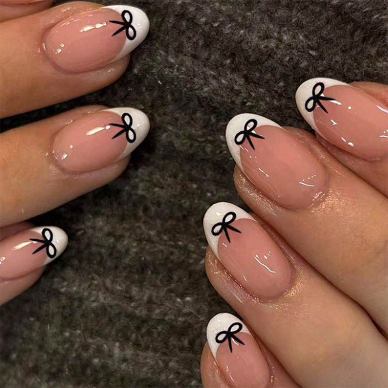 Kunstnagelset mit verspieltem Schleifen-Design Brehn