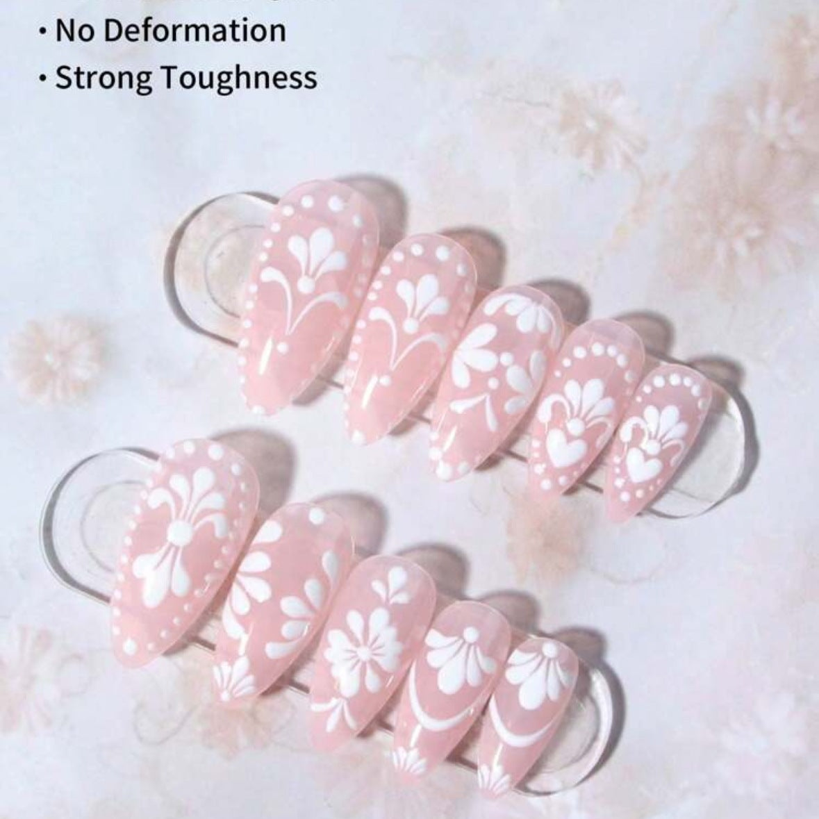 Kunstnagelset mit filigranen Blüten und eleganten Konturen Brehn