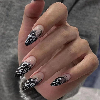 Künstlerische Stiletto Press-On Nägel mit abstraktem Design Brehn