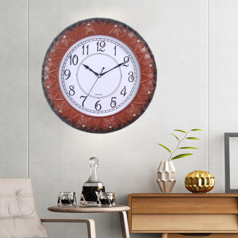 Elegante Wanduhr mit Filigranem Blumendesign Brehn