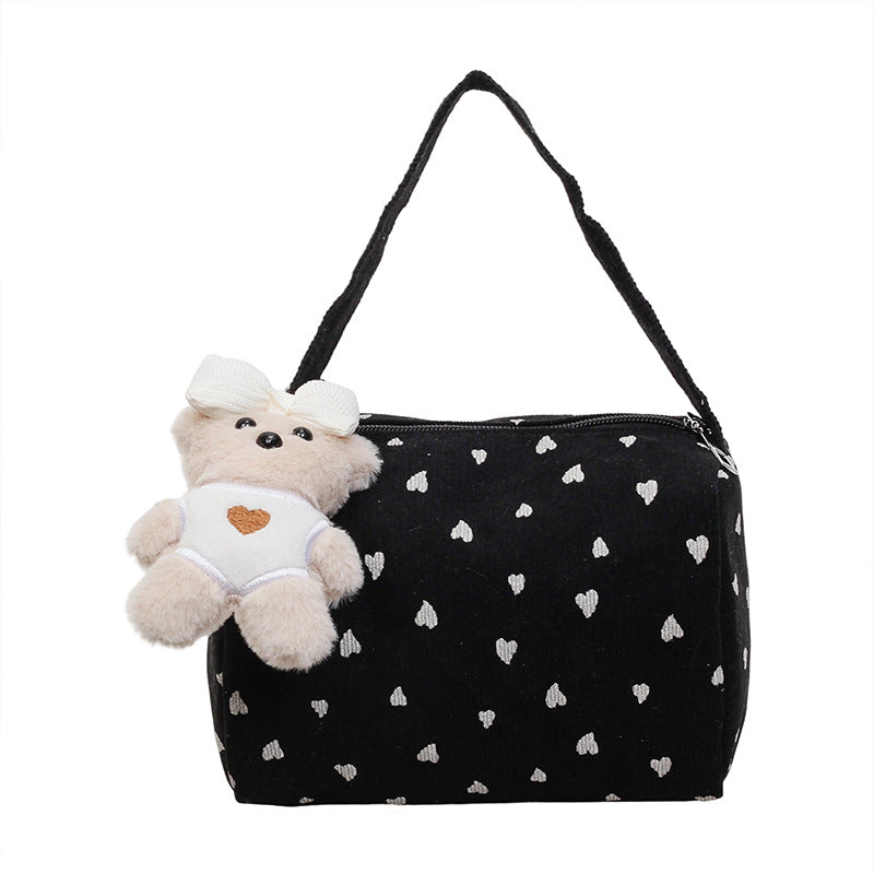 Hübsche Handtasche mit Herzmuster
