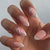 Elegantly gestaltete florale begleitete Stiletto-Nagelkunstverlängerungen Brehn