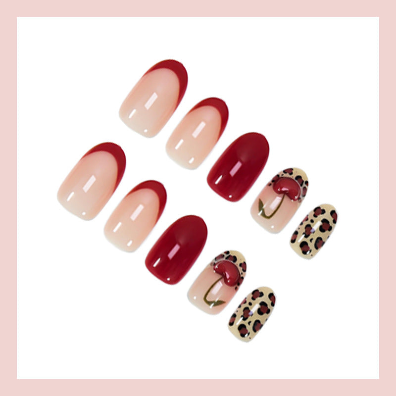 Kunstnagelset mit trendigen Leopard- und Kirschmotiven Brehn