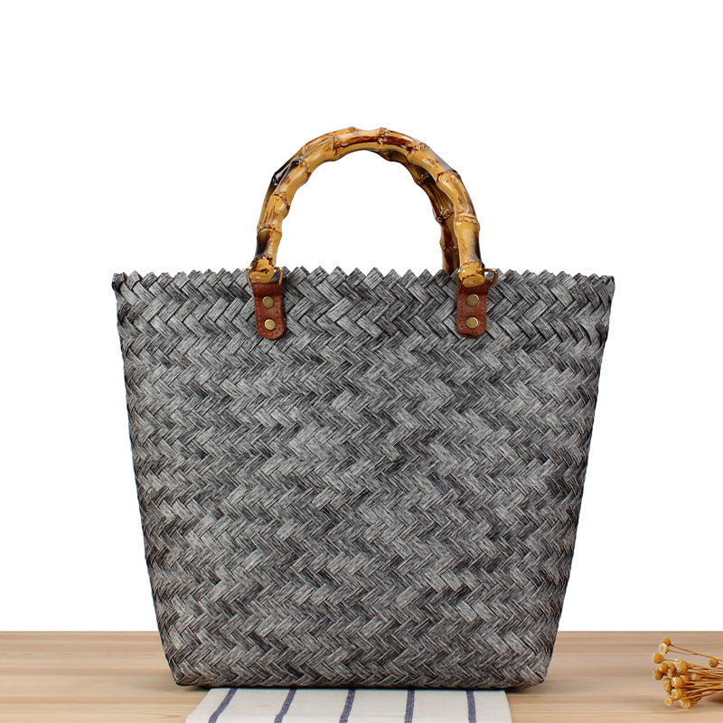 Handtasche Aus Hochwertigem Geflochtenem Material mit Bambusgriffen Brehn