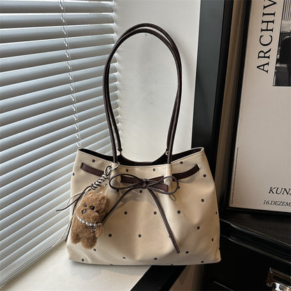 Elegante gepunktete Tragetasche