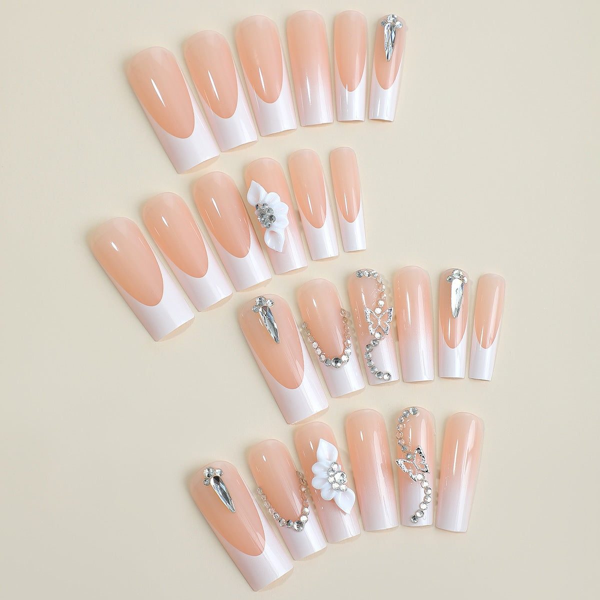 Kunstnagelset mit eleganten 3D-Akzenten und Glitzerverzierungen Brehn